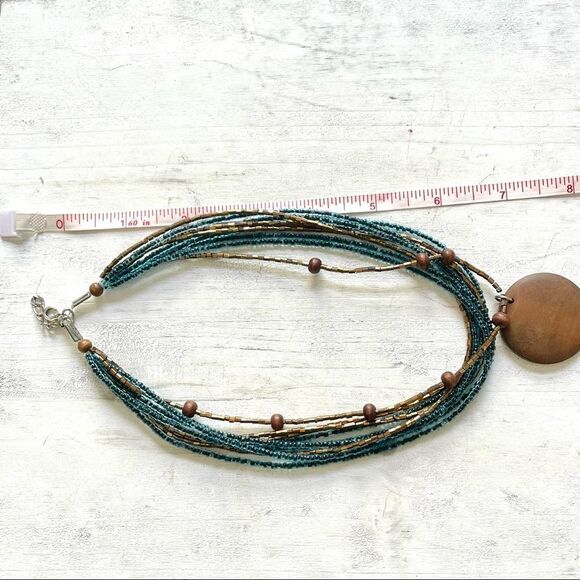 Blue and gold beaded multi strand wood pendant necklace - Picture 3 of 10